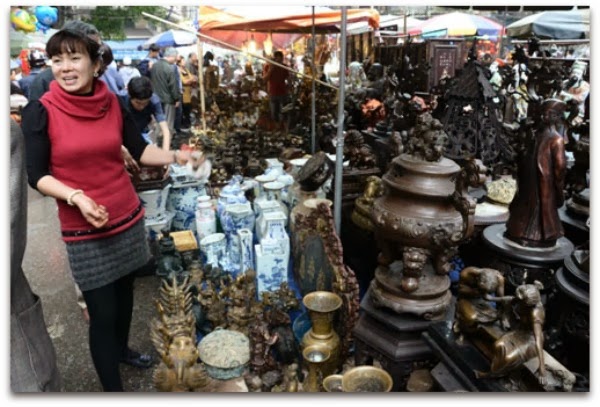 Friendly smile of vietnamese woman going to the market